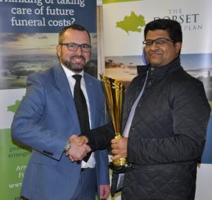 Performance of the season award went to Abbotsbury's Krishnan Subramanian for taking 9 for 12. Shane Watson (left) is from the sponsors, The Dorset Funeral Plan.