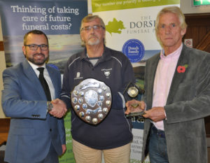 Shane Watson (left) from the sponsors, The Dorset Funeral Plan, with Richard Langford and Buddy Langford, the Div 2 winners .