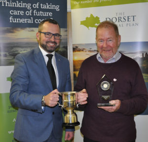 Shane Watson (left) from the sponsors, the Dorset Funeral Plan, with Eric Ball from Shroton CC, Div 1 winners.