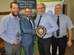 Shane Watson (second left) from the sponsors, the Dorset Funeral Plan, with (l-r) Jae Miller, Pete Tucker and Rich Fagence from Div 4 winners Charlton Down CC.