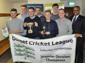 Wimborne CC - Premier League champions! Nick Douch (far right) from the sponsors, The Dorset Funeral Plan, with (l-r) Lewis Naylor, Frank Torrill, james Miller, Colin Randall, Simon Woodruff, George Bartlett and Graham Cole.