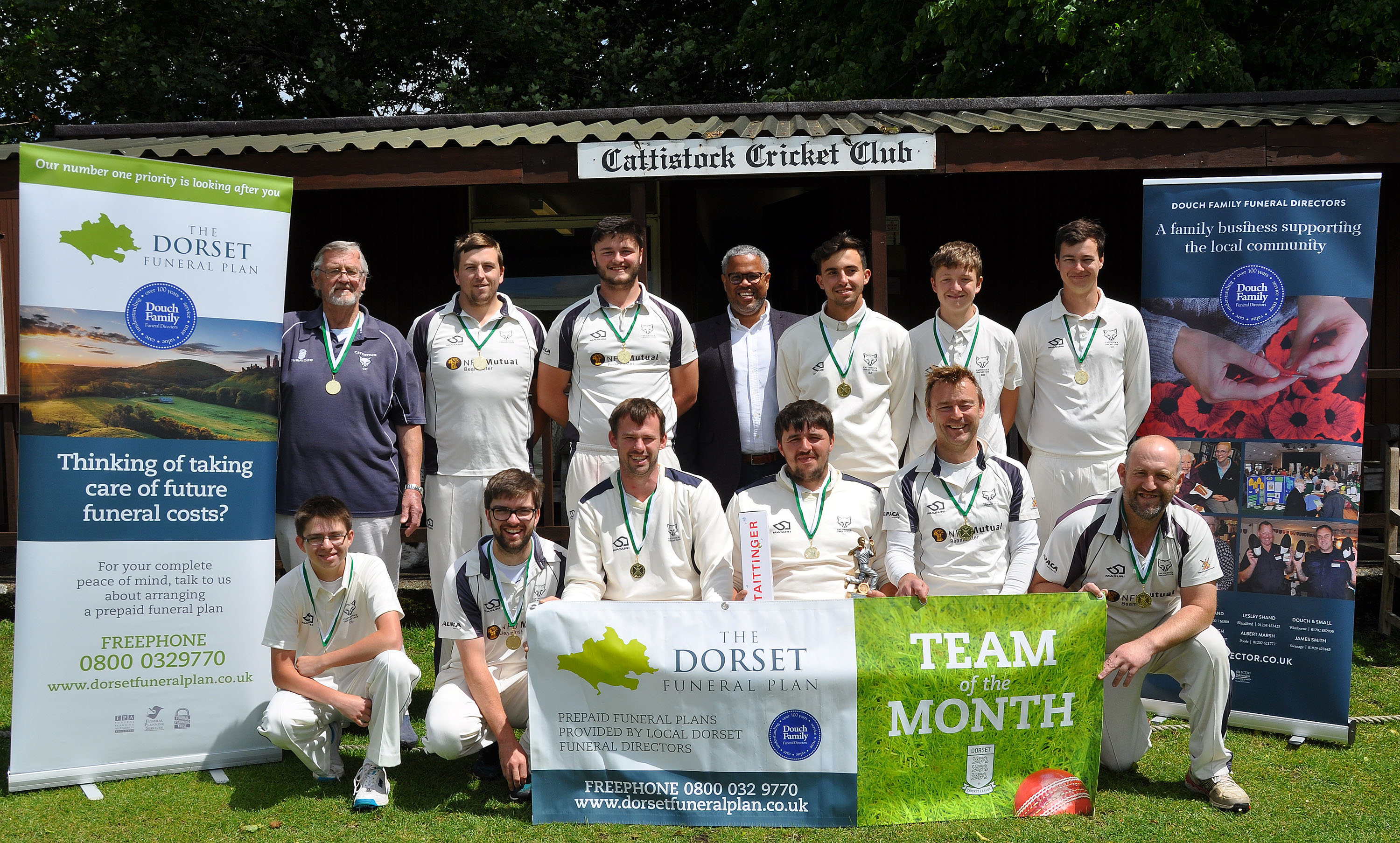photo of Cattistock Cricket Club being presented with medals, trophy and bubbly for Team of The Month