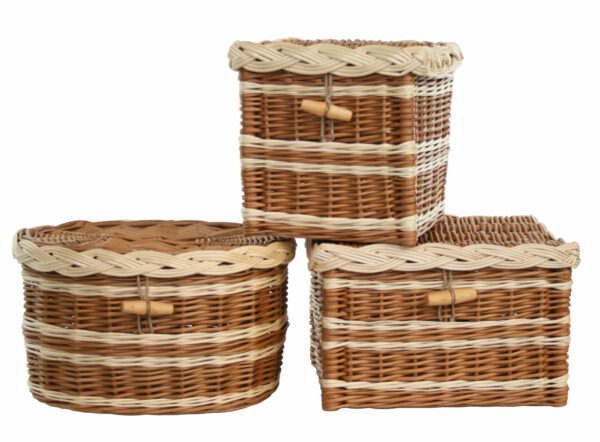 Three natural willow ashes caskets in various shapes stacked in a pyramid.