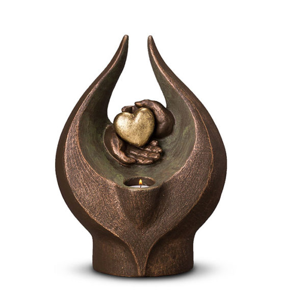 geert-kunen-designer-urn-hands-holding-heart-ceramic-urn-with-candl