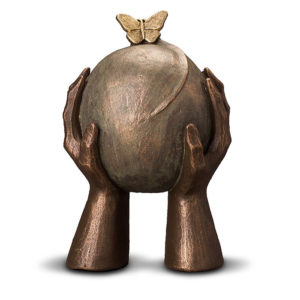 geert-kunen-designer-urn-butterfly-sphere-in-hands-ceramic-bronze-urn