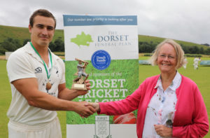 Chalke Valley captain receiving award from Judy Douch, of sponsors, Dorset Funeral Plan