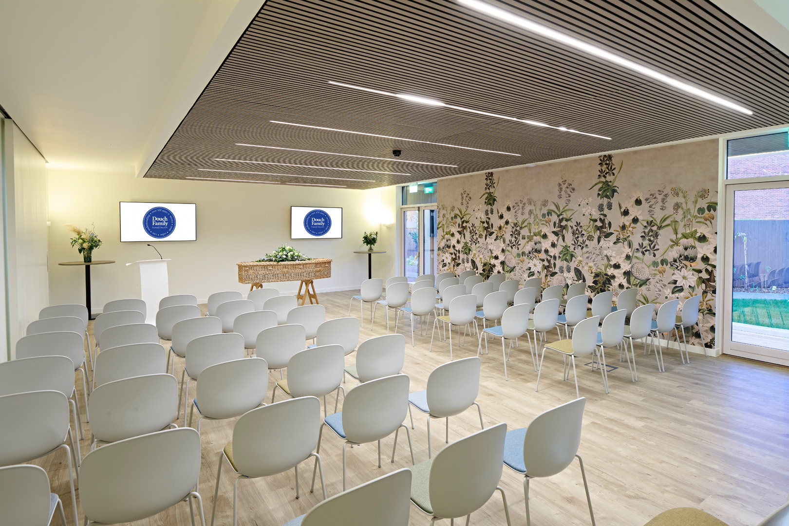 Ferndown funeral ceremony room with rows of seating.